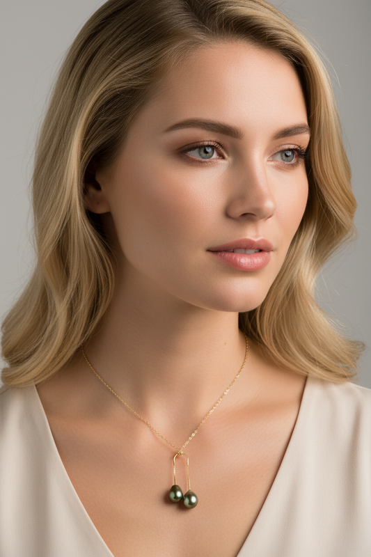 blonde model wearing Double Tahitian Teardrop Pearl Pendant 14K Yellow Gold – U-Chain Design