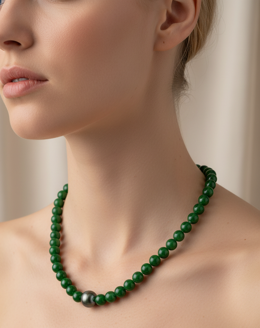 Closeup of a model wearing Jade & Tahitian Pearl Strand Necklace with Sterling Silver Clasp
