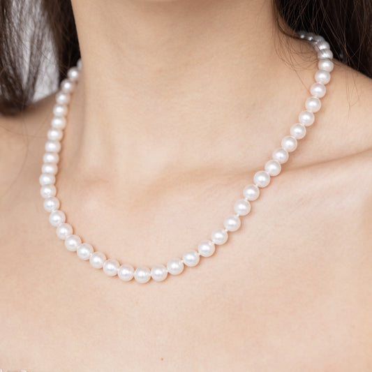 18-Inch Japanese Akoya Pearl Necklace on Model, 14K Yellow Gold Clasp