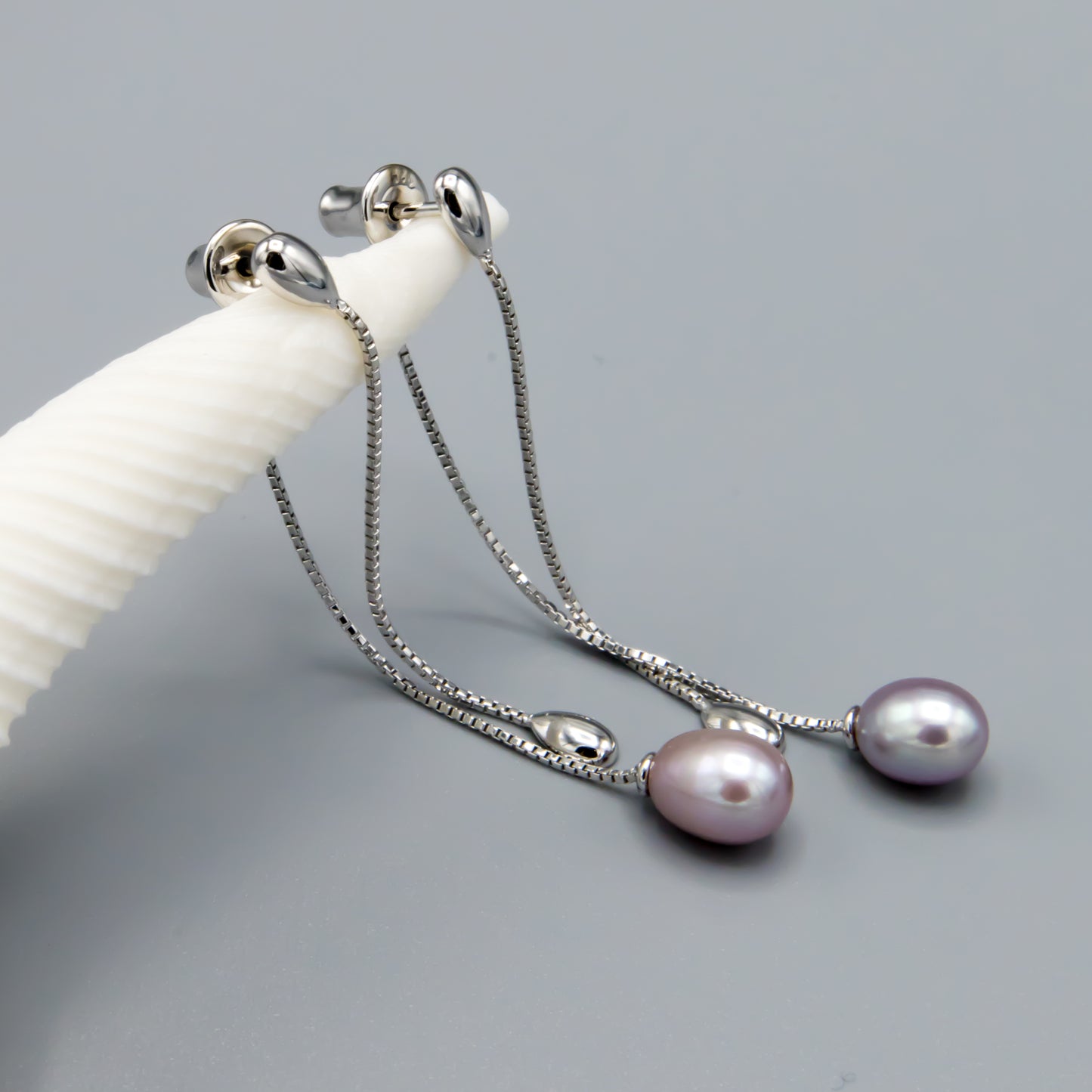 Freshwater pearl earring jackets in mauve, versatile sterling silver design