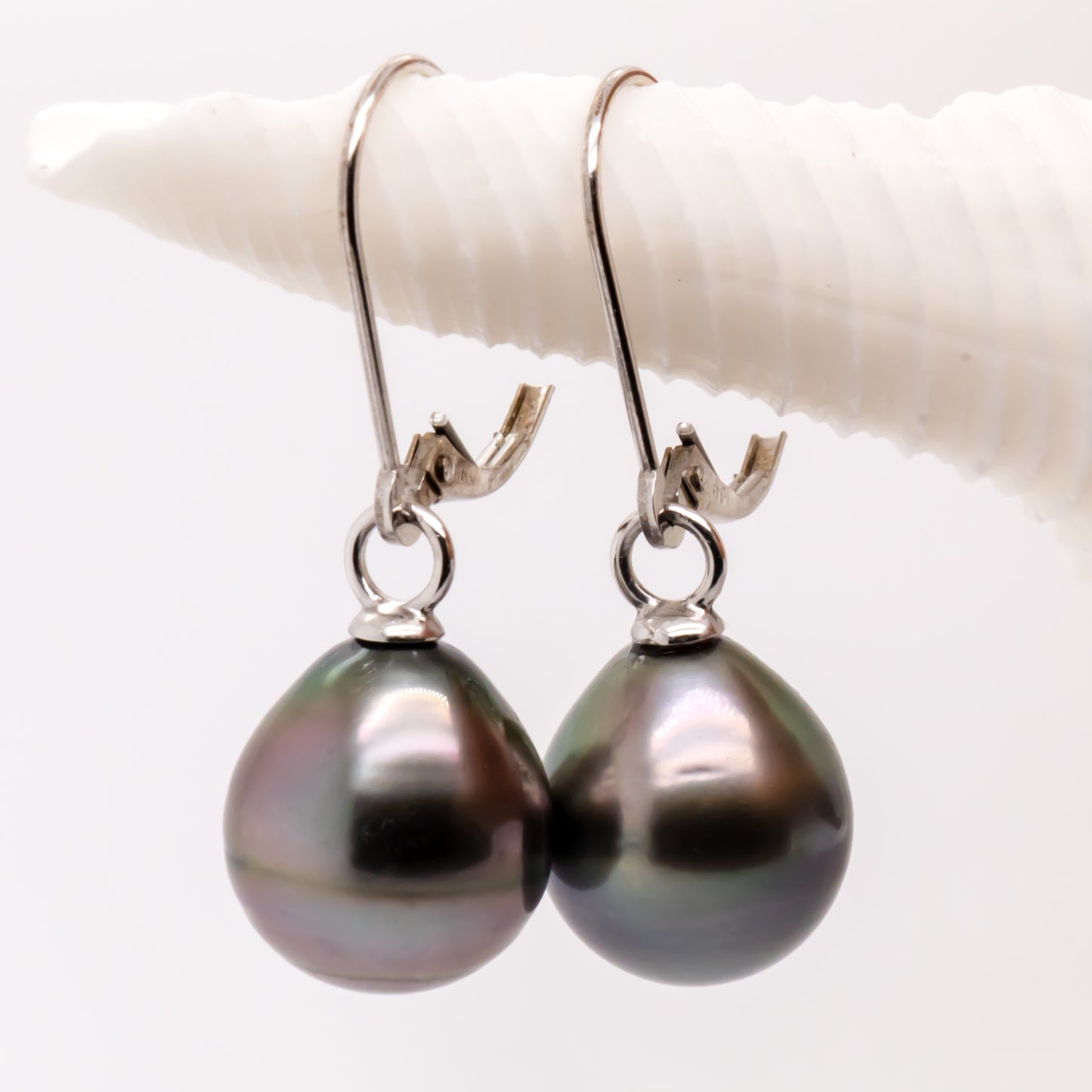 12-12.5mm Tahitian pearl earrings showcasing natural dark peacock luster and gold setting