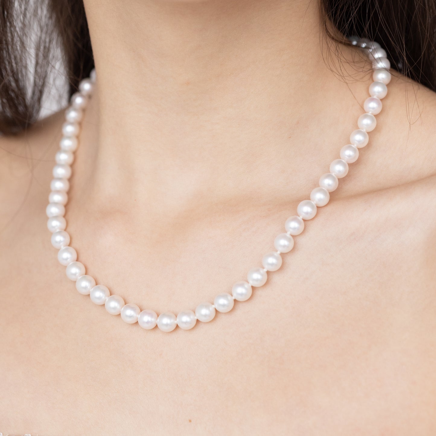 18-Inch Japanese Akoya Pearl Necklace on Model, 14K Yellow Gold Clasp