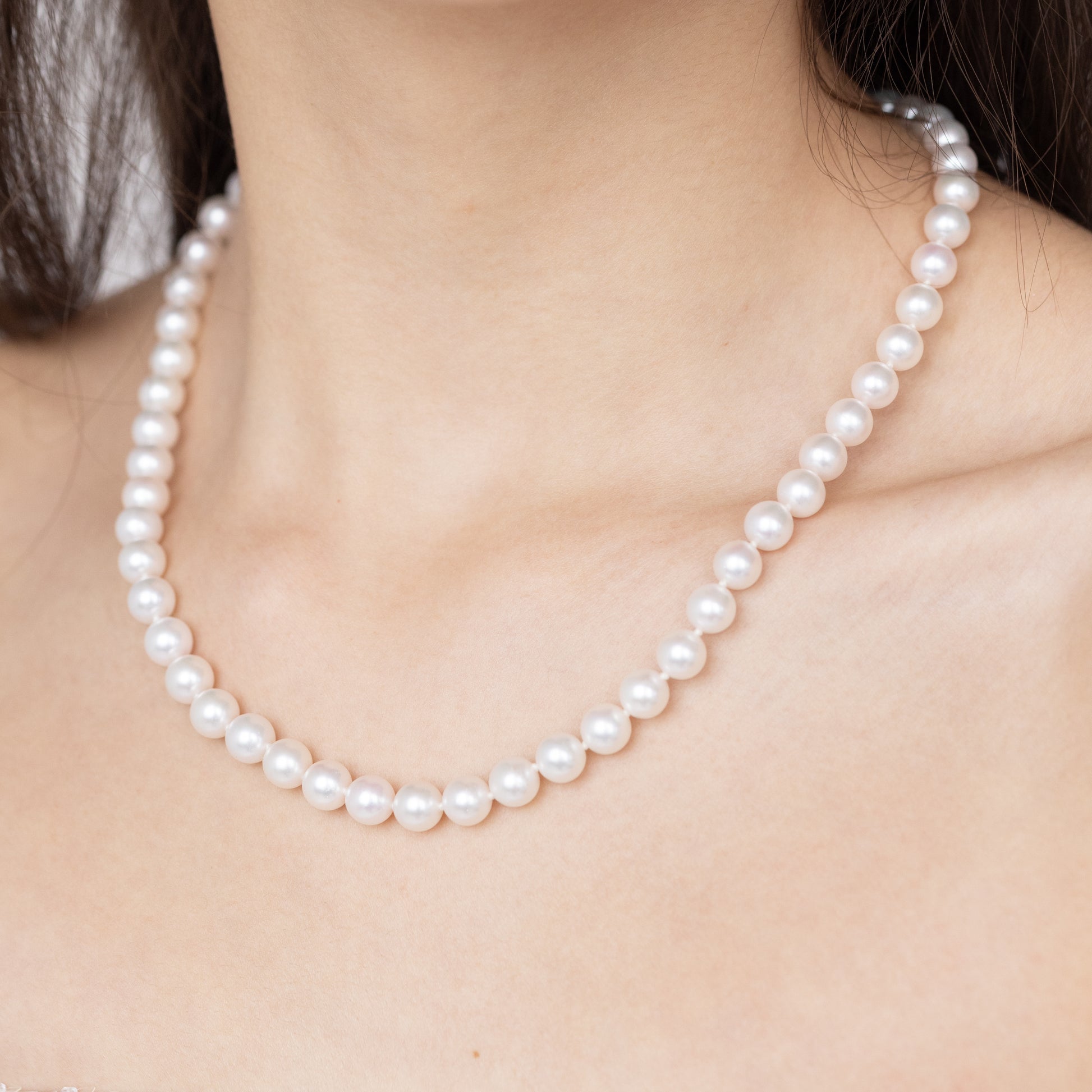 18-Inch Japanese Akoya Pearl Necklace on Model, 14K Yellow Gold Clasp
