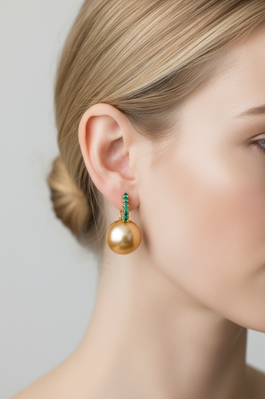 Golden South Sea Pearl & Emerald Drop Earrings in 18K Yellow Gold on blonde model