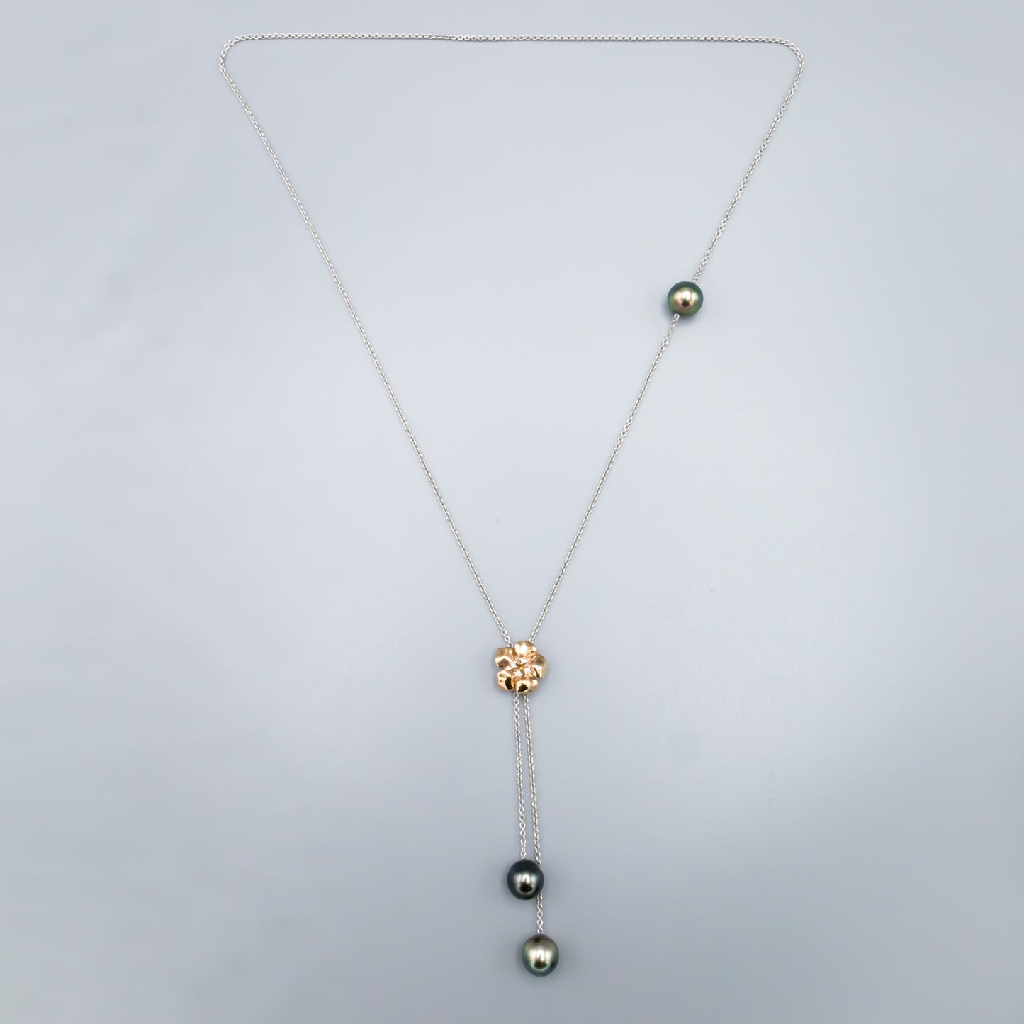 Rose gold plated flower pendant necklace with cubic zirconia