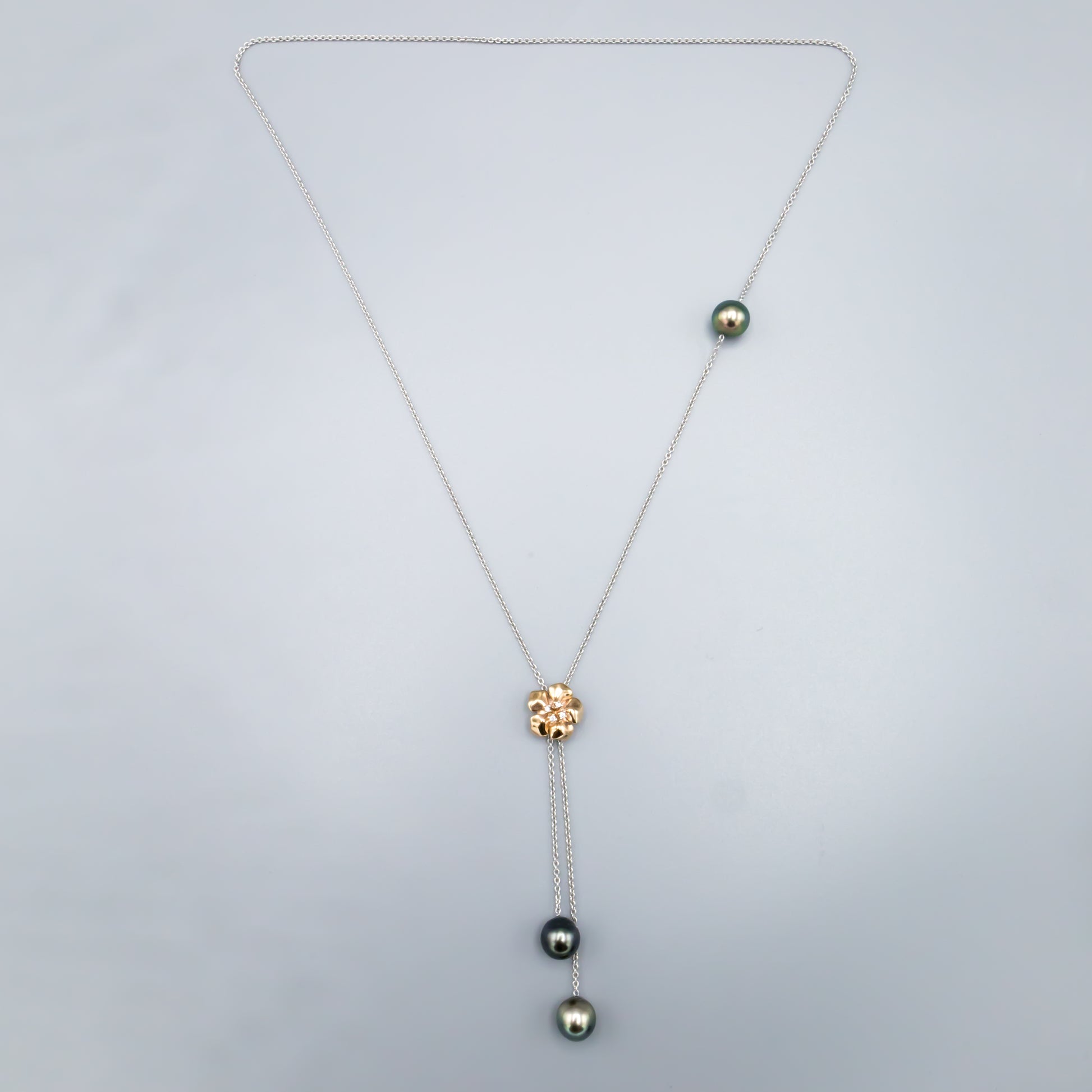 Rose gold plated flower pendant necklace with cubic zirconia