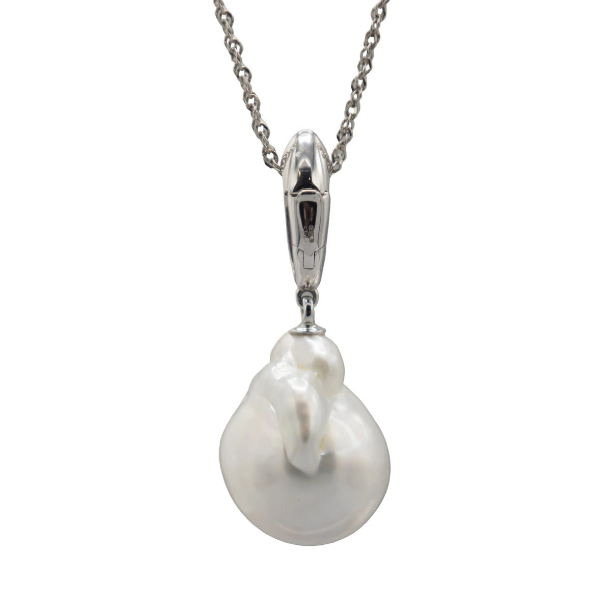 A single white baroque south sea pearl enhancer pendant in a silver clasp, shown against a white background--rear side view.