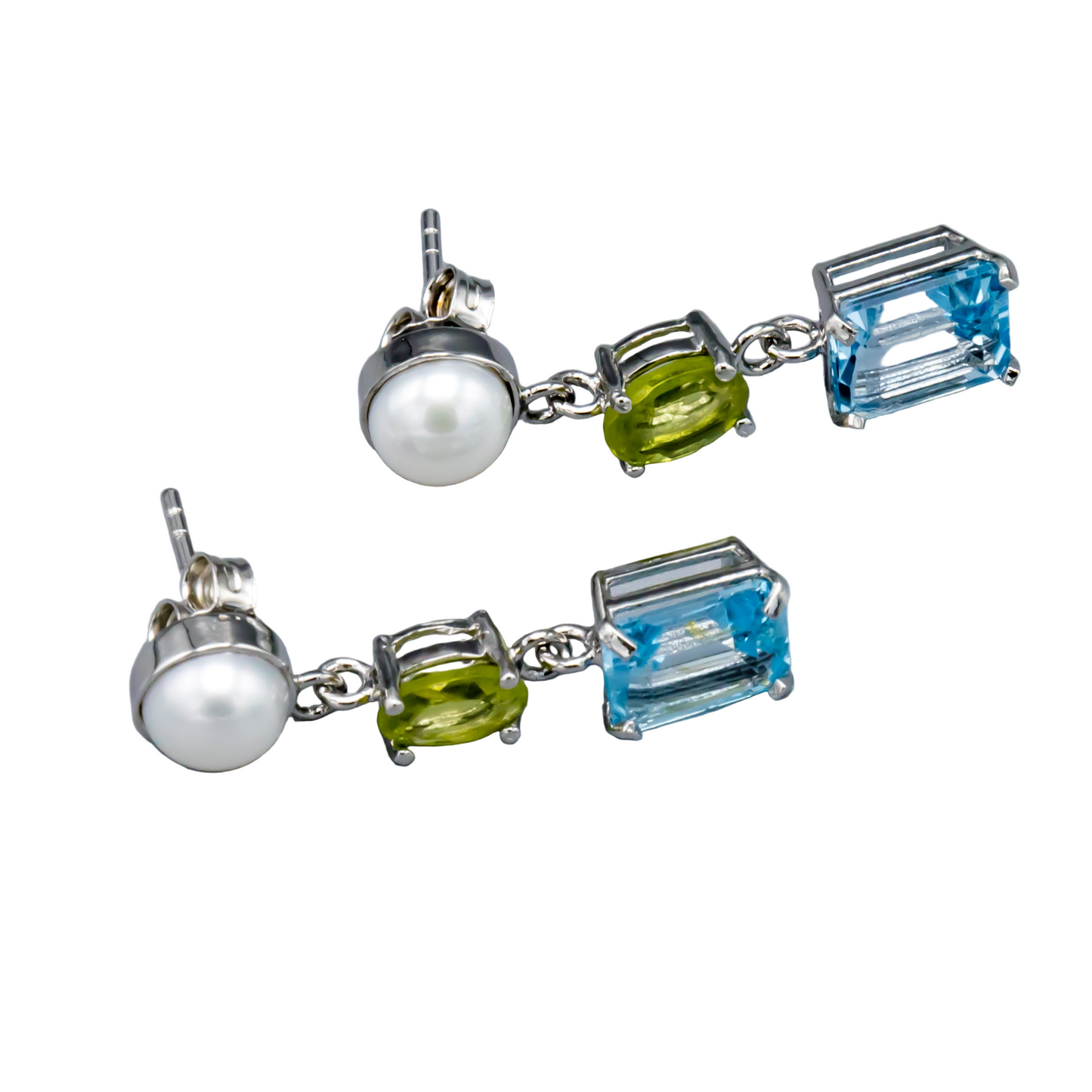 Sterling silver pearl earrings with colorful gemstone accents close-up detail view