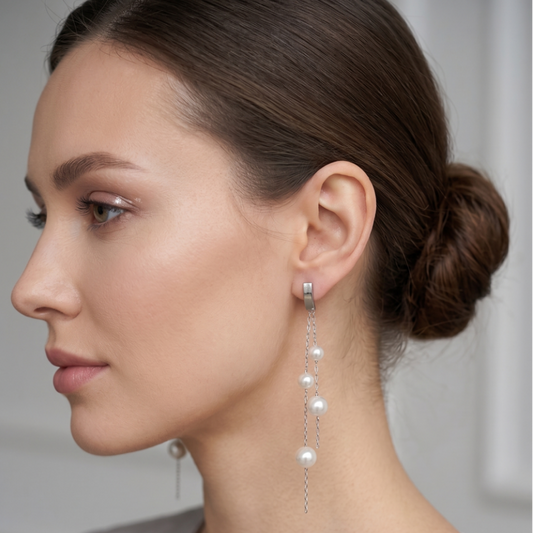 Model wearing Akoya saltwater pearl double dangle earrings in 14K white gold