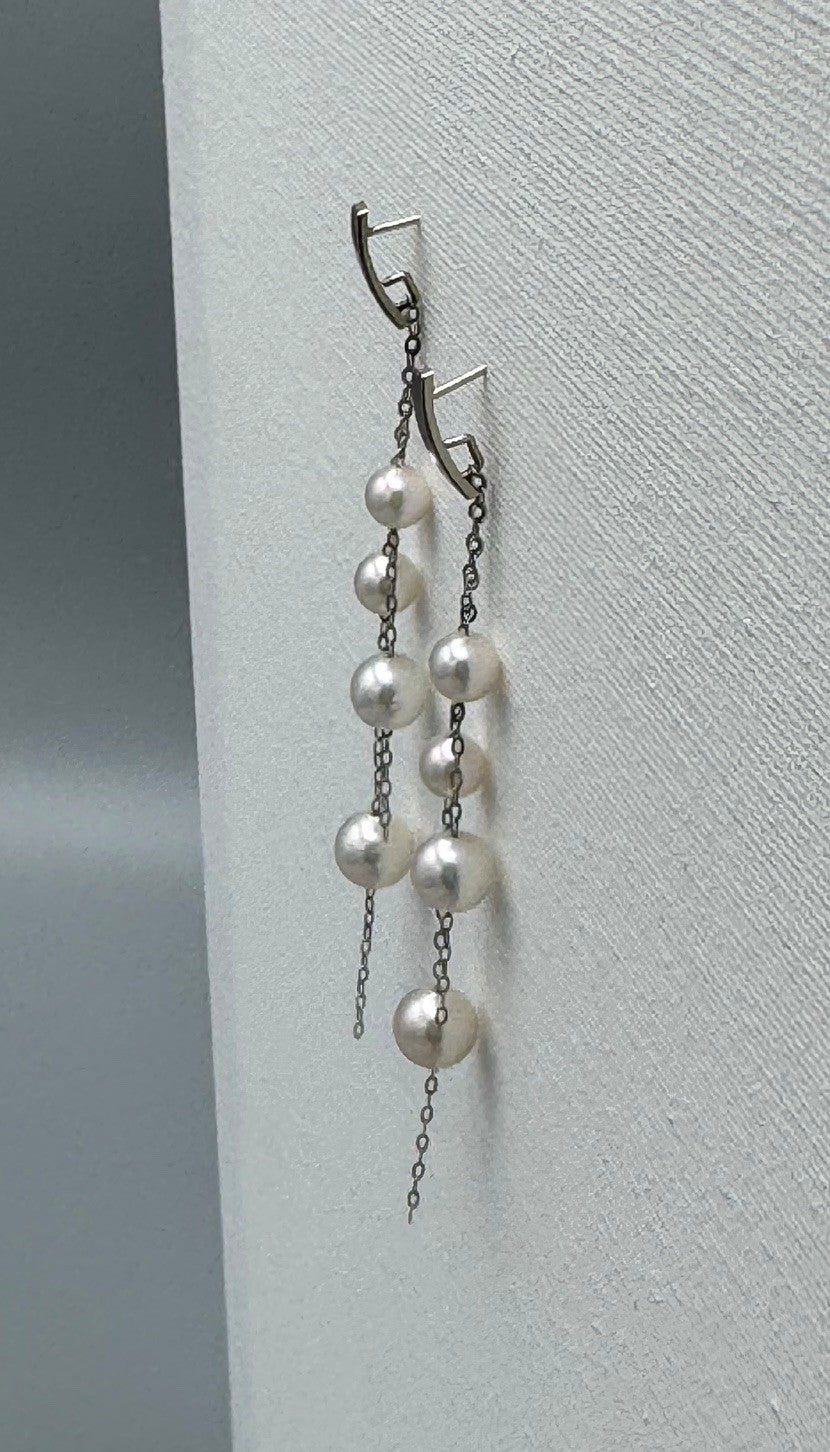 Akoya pearl double dangle earrings in 14K white gold, side angle view