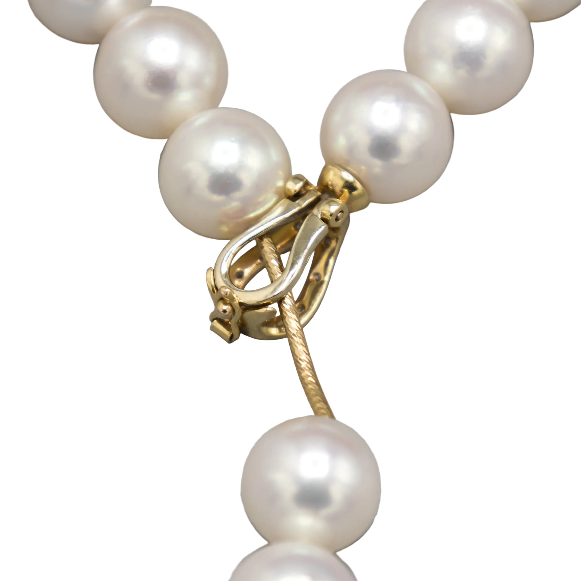 Close-up of the 14K yellow gold lariat clasp on the Holly Zhang Akoya pearl necklace, shown open to illustrate the adjustable lariat mechanism.