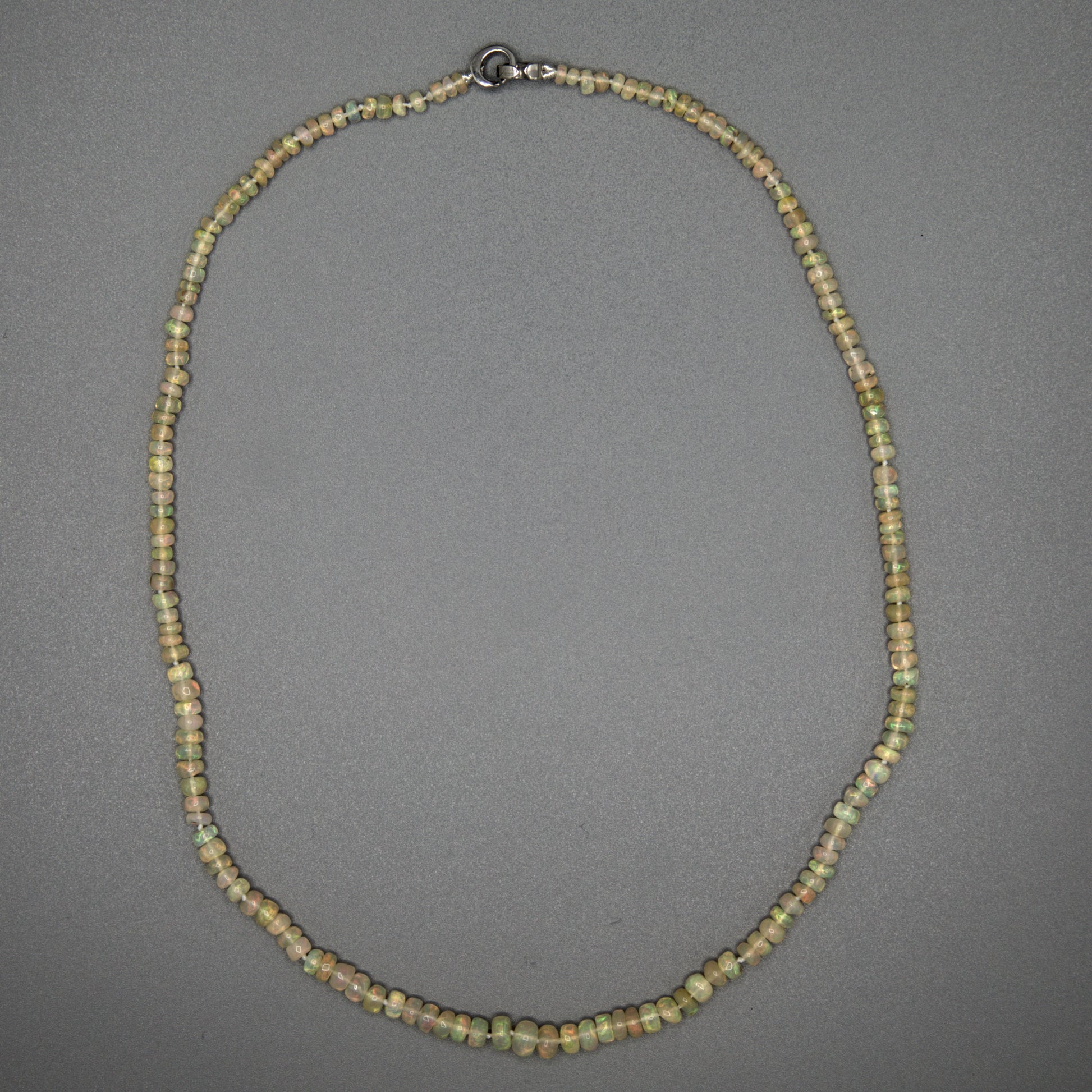 African opal beaded necklace close-up showing natural green opal beads