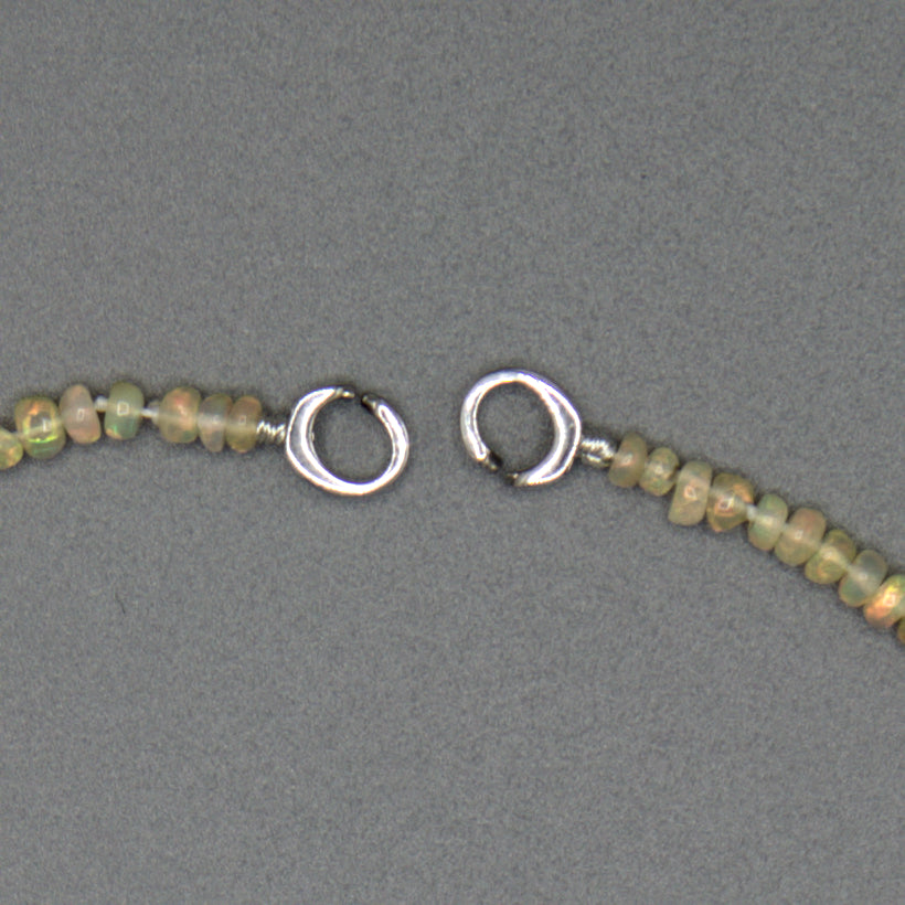 20-inch African Opal & Akoya Pearl Necklace flat lay, sterling silver clasp
