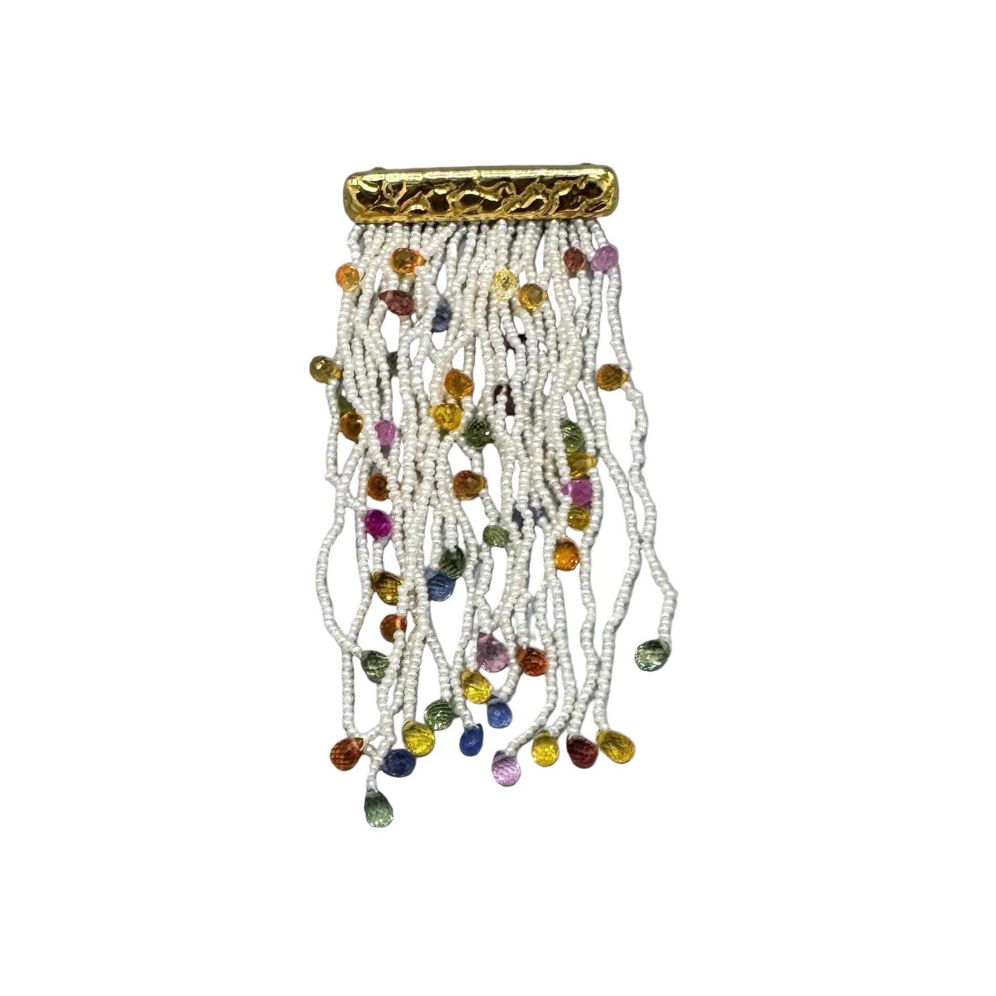 Akoya Keshi pearl fringe brooch with ruby and sapphire accents on 18K yellow gold bar, white background