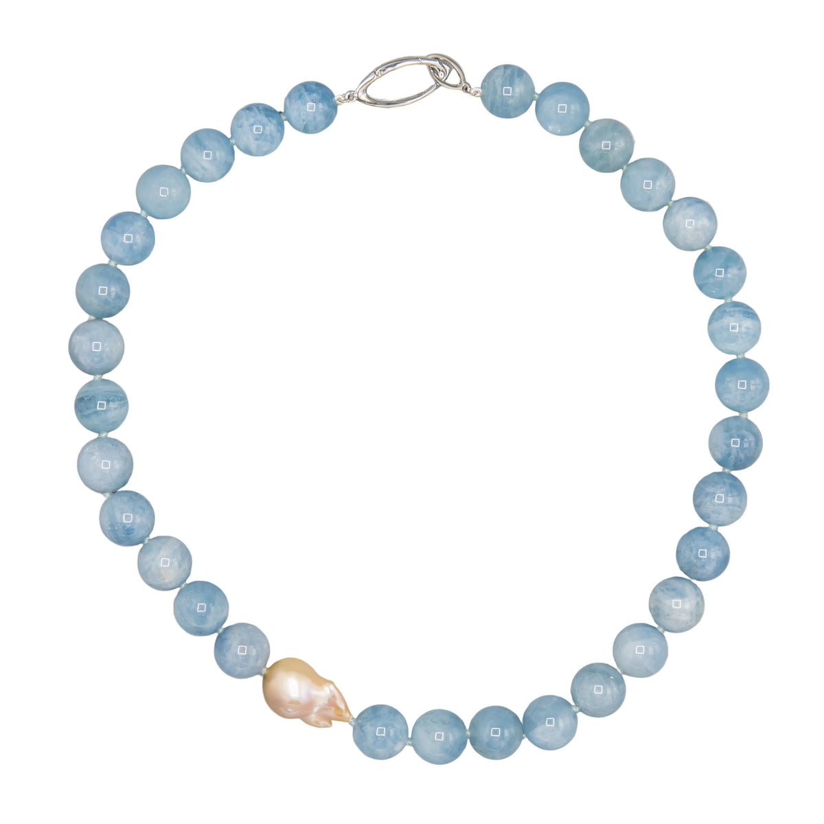Aquamarine bead necklace with peach baroque freshwater pearl and sterling silver clasp, flat lay