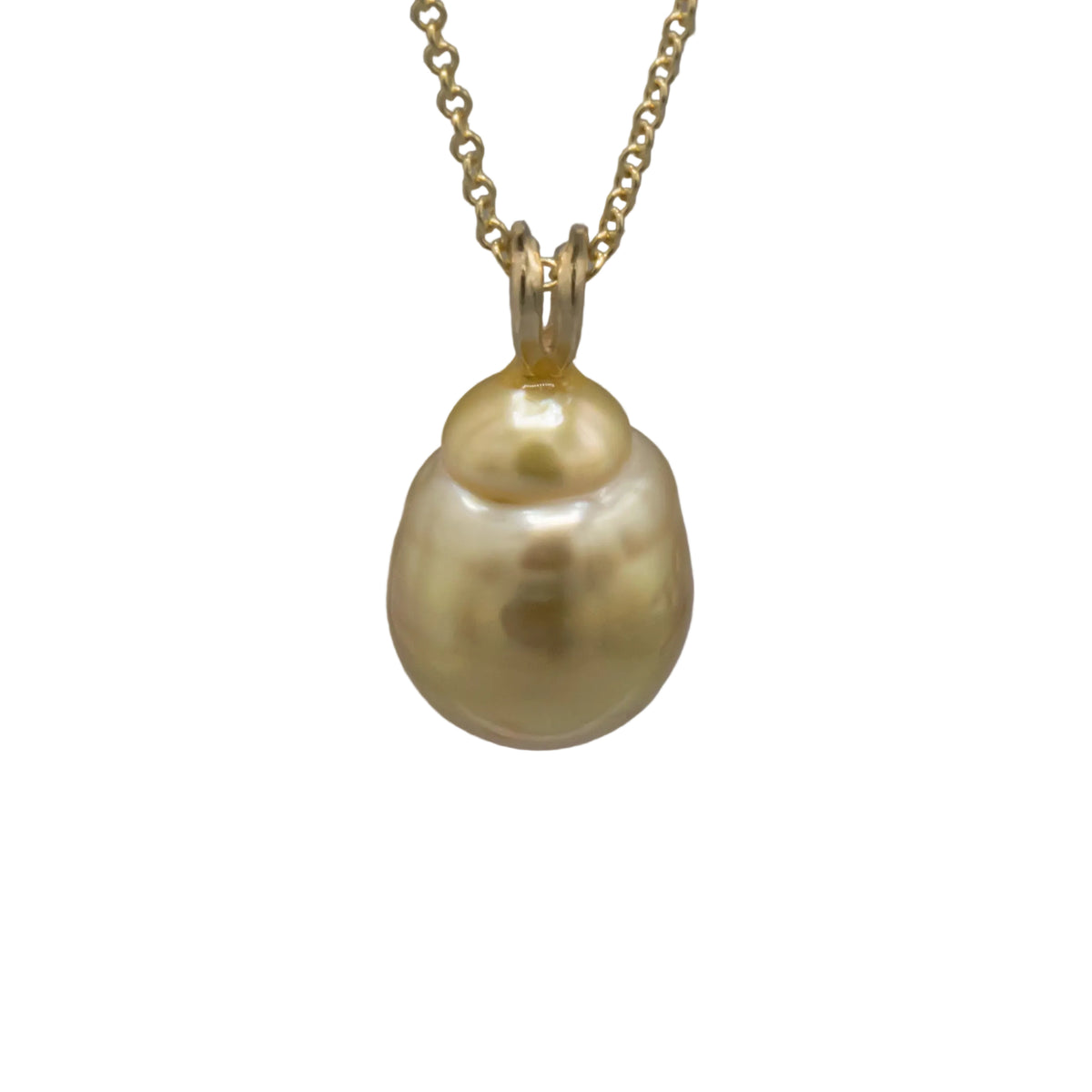 A gold pendant necklace featuring a large, irregular baroque pearl with a soft pearlescent yellow-gold luster, suspended from a delicate gold chain against a neutral gray gradient background.