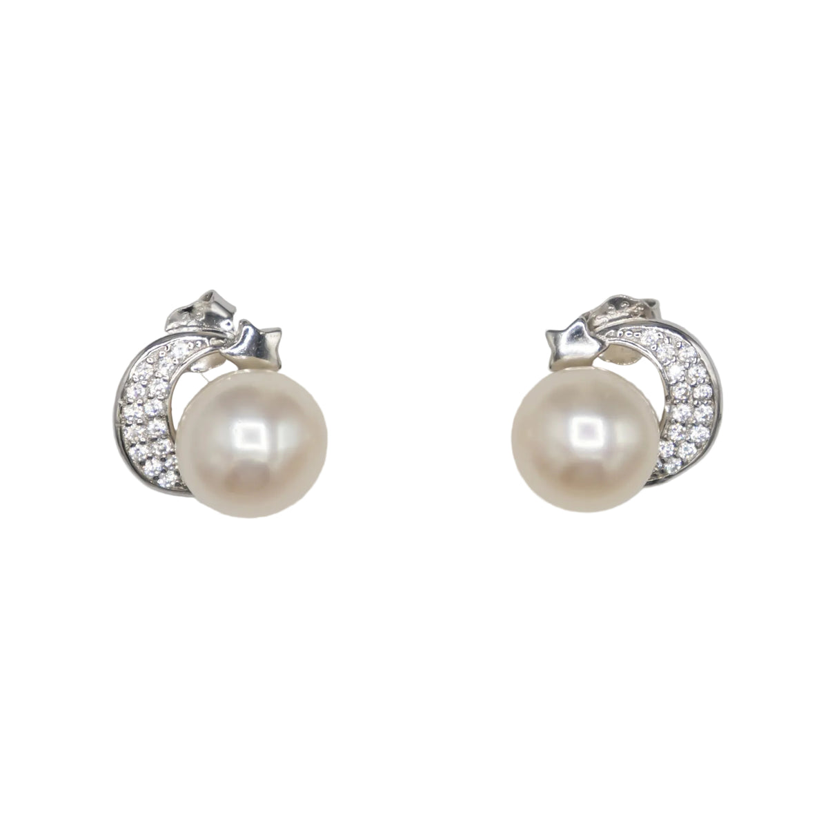 A pair of freshwater pearl crescent moon stud earrings in sterling silver with cubic zirconia.