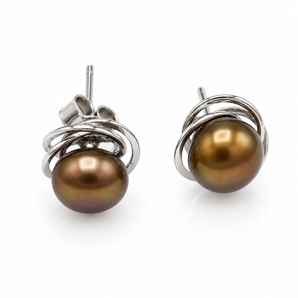 A pair of stud earrings featuring round, iridescent brown freshwater pearls wrapped in polished silver coils, shown on a white background.