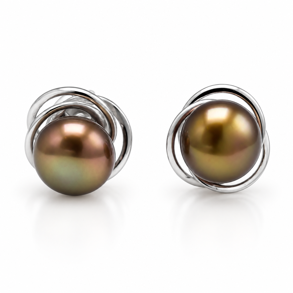 A pair of stud earrings featuring round iridescent brown pearls set in silver-toned metal with overlapping spiral bands, shown on a neutral light gray background.